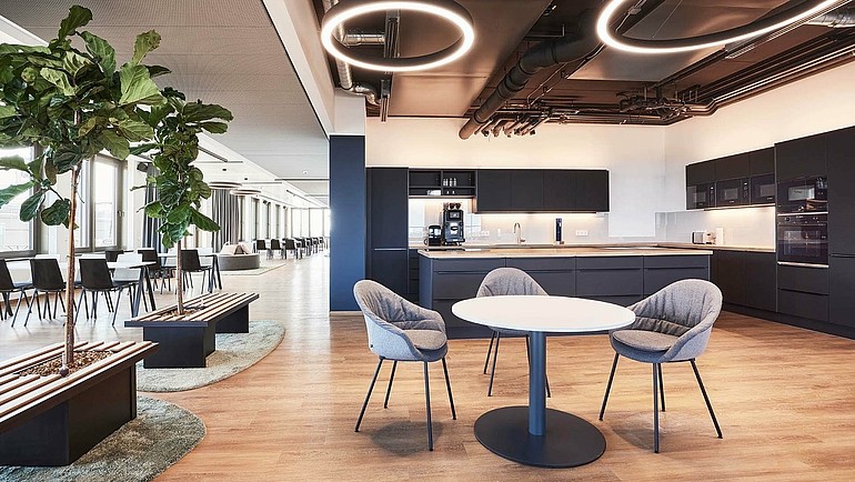 A large common area and kitchen in Agile Robots’ headquarters in Munich