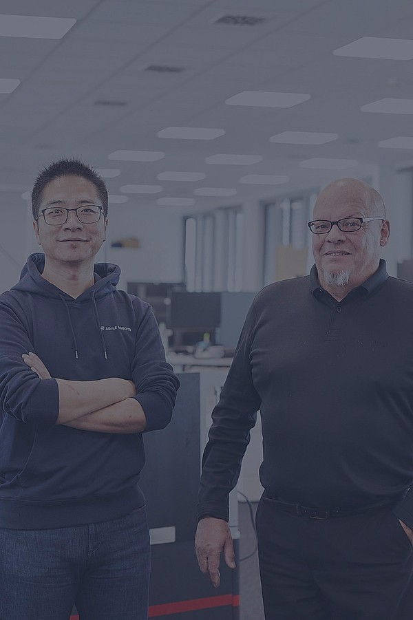 The two founders of Agile Robots: Dr. Zhaopeng Chen and Peter Meusel